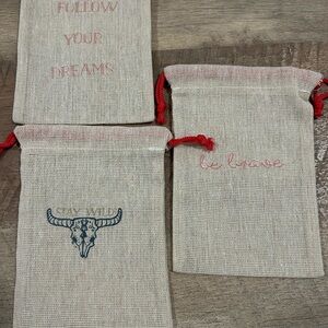 Set of Burlap Drawstring Bags with Red Accents